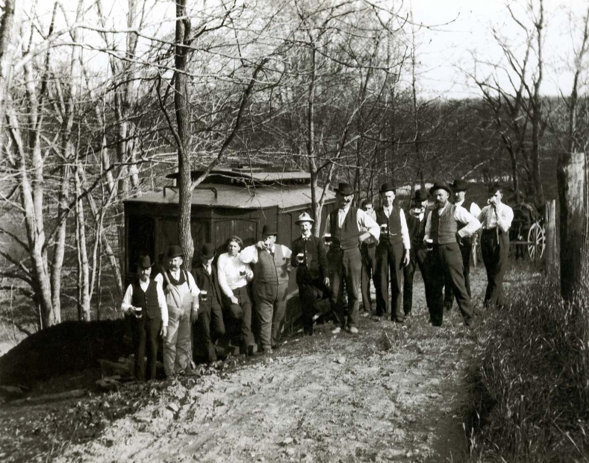 Men drinking beer near Brandywine Creek