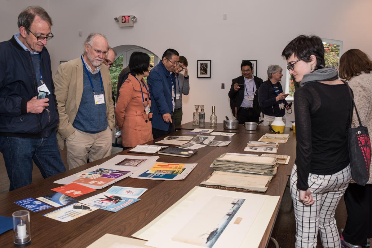 In the Soda House, the group sees a selection of items from bottles and household appliances to ads and drawings. Photo by Jackie Kane Photography.