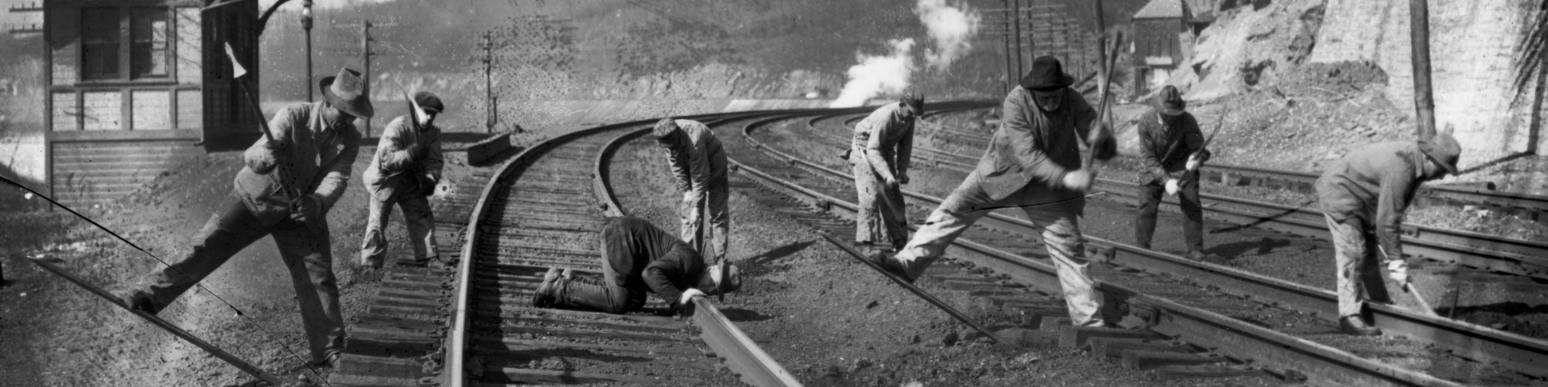 res-stacks-banner-railroad-workers-leveling-tracks-hagley-PRR_ME4488.jpg