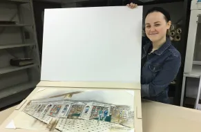 WhiteJohnson Erin Cunningham holding the sink mat.JPG